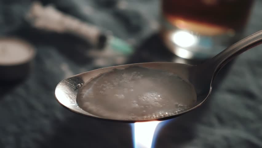 step by step how to cook coke into crack on a spoon